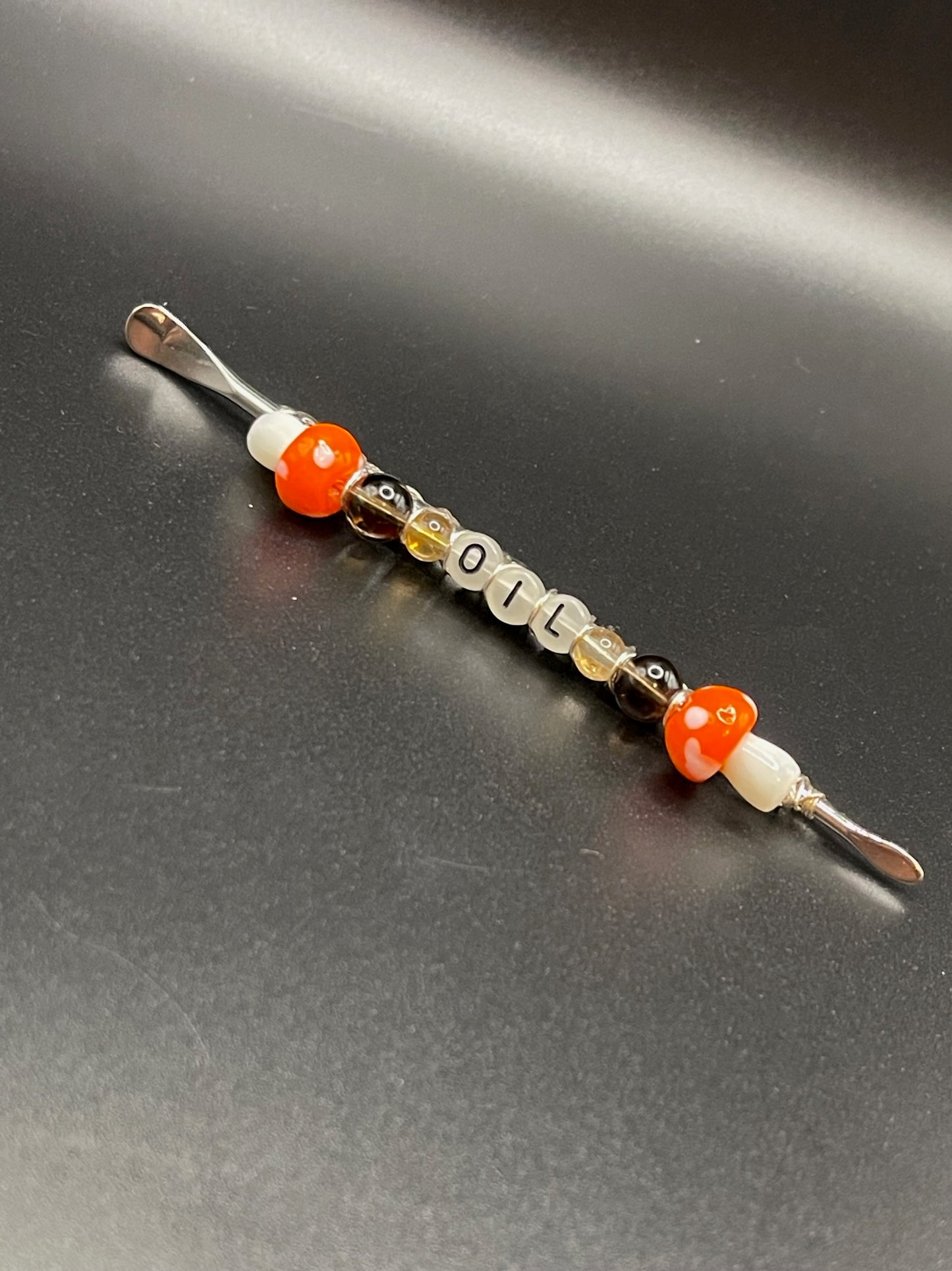✨ Radiant Illumination: Silver Sheen Obsidian Dab Tool with Orange Mushrooms and Glow-in-the-Dark Letters ✨