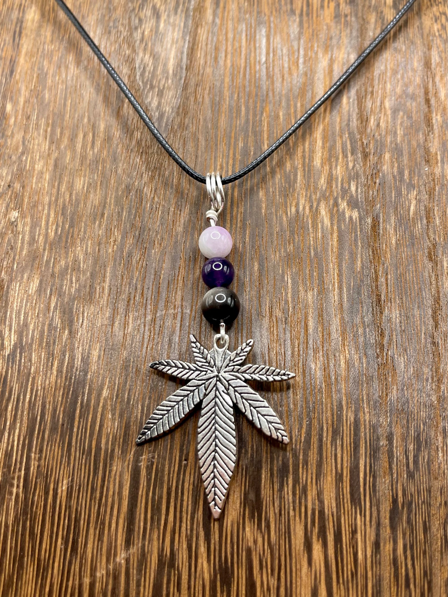 ✨ Nature’s Harmony: Kunzite, Amethyst and Silver Sheen Obsidian Crystal Necklace with Marijuana Leaf Charm ✨